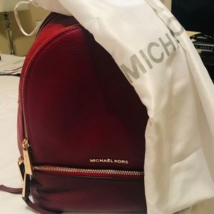 Micheal Kors backpack ( used once)
